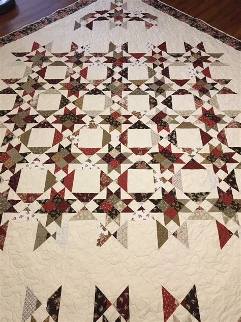 Start by cutting the fabric into 2 1/2 inch strips to make the log cabin blocks. . Nine sisters quilt pattern pdf